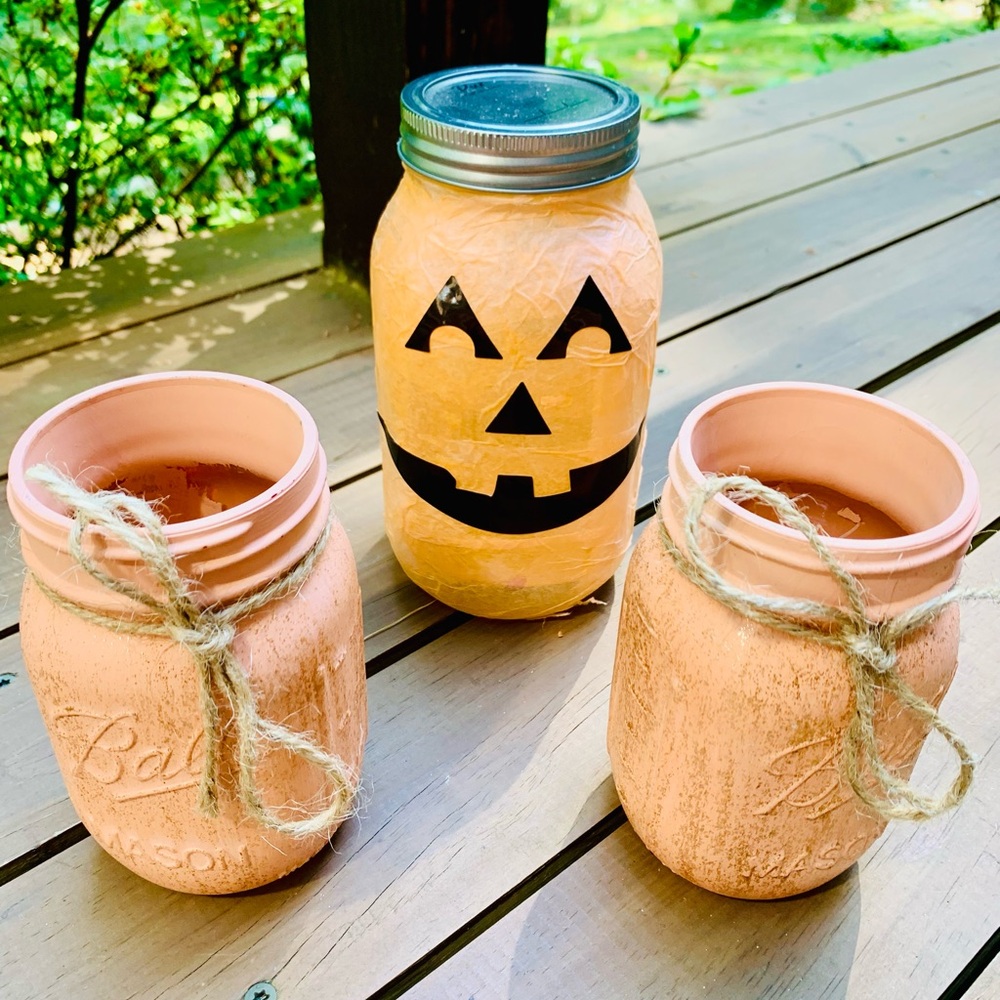 Set of Three Halloween themed jack-o’-lantern pumokin Mason Jars candle